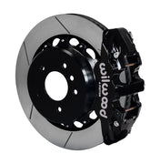 Wilwood BMW rear AERO4 brake kit assembly example, showing a black caliper positioned over the slotted rotor and mounting hat