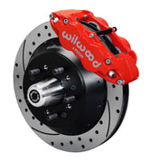 Wilwood full-size Ford/Edsel/Mercury front Superlite brake kit assembly example, showing a red caliper positioned over the drilled and slotted rotor and mounting hat