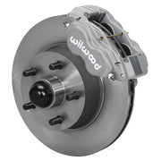 Wilwood full-size front Dynalite-M brake kit assembly example, showing an anodized caliper positioned over the plain-face rotor/hub