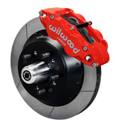 Wilwood full-size front 14-inch Superlite brake kit assembly example, showing a red caliper positioned over the slotted rotor and mounting hat