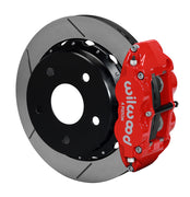 Wilwood Bronco New Style rear 12.88-inch Superlite brake kit assembly example, showing a red caliper positioned over the slotted rotor and mounting hat