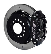 Wilwood staggered Big Ford New Style rear brake kit assembly example, showing a black caliper positioned over the slotted rotor and mounting hat