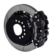 Wilwood staggered GM 12-bolt rear brake kit assembly example, showing a black caliper positioned over the slotted rotor and mounting hat