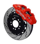 Wilwood Mustang BMR front AERO6 brake kit assembly example, showing a red caliper positioned over the drilled and slotted rotor and mounting hat