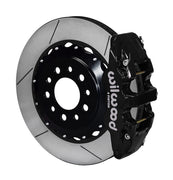 Wilwood Corvette C7 rear AERO4 brake kit assembly example, showing a black caliper positioned over the slotted rotor and mounting hat