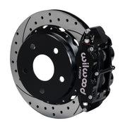 Wilwood Bronco 2.00-inch-offset rear Superlite brake kit assembly example, showing a black caliper positioned over the drilled and slotted rotor and mounting hat