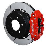 Wilwood six-lug F-150 rear Superlite 6R brake kit assembly example, showing a red caliper positioned over the slotted rotor and mounting hat