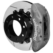 Wilwood Super Duty 4WD rear TX6R brake kit assembly example, showing an anodized caliper positioned over the slotted rotor and mounting hat