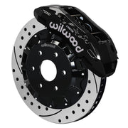 Wilwood black TX6R caliper over an assembled 16.00-inch drilled-and-slotted rotor and separate mounting hat
