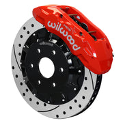 Wilwood red TX6R caliper over an assembled 16.00-inch drilled-and-slotted rotor and separate mounting hat