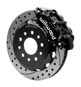 Wilwood black Superlite 6R caliper over an assembled 12.88-inch drilled-and-slotted rotor and separate mounting hat