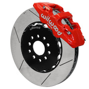 Wilwood red AERO6 front caliper with an assembled 15-inch slotted rotor and black mounting hat, shown for C5/C6 Corvette and XLR