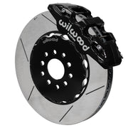 Wilwood black AERO6 front caliper with an assembled 15-inch slotted rotor and black mounting hat, shown for C5/C6 Corvette and XLR