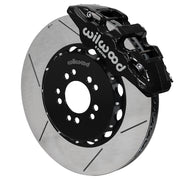 Wilwood black AERO6 front caliper with an assembled 15-inch slotted rotor and black mounting hat, shown for C7 Corvette