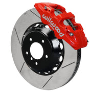 Wilwood red AERO6 front caliper with an assembled 15-inch slotted rotor and black mounting hat, shown for listed BMW 1 and 3 Series applications