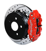 Wilwood red Superlite 4R caliper over an assembled 12.88-inch drilled-and-slotted rotor and separate mounting hat