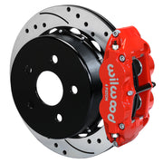 Wilwood red Superlite 4R caliper over an assembled 14.00-inch drilled-and-slotted rotor and separate mounting hat