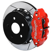 Wilwood red Superlite 4R caliper over an assembled 14.00-inch slotted rotor and separate mounting hat