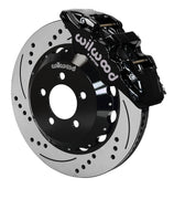 Wilwood black AERO6 caliper over an assembled 14.25-inch drilled-and-slotted rotor and separate mounting hat
