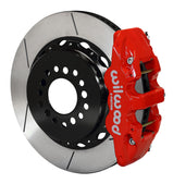 Wilwood red AERO4 caliper over an assembled 14.25-inch slotted rotor and separate mounting hat