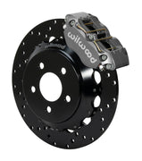 Wilwood gray Dynapro radial front drag-race caliper with a 12.9-inch drilled steel rotor and black hat, shown for S550 Mustang or specified Ridetech hubs