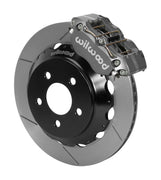 Wilwood gray Dynapro radial caliper over an assembled 12.88-inch slotted rotor and separate mounting hat
