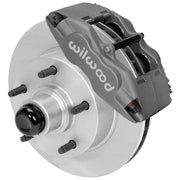 Wilwood gray Superlite front caliper around an 11.72-inch plain vented hub-and-rotor unit with studs, shown for Ford F1/F-100 drum spindles