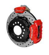 Wilwood red Dynalite service caliper and MC4 parking caliper around a 12.19-inch drilled-and-slotted rotor, shown for modified GM 12-bolt axles with staggered shocks