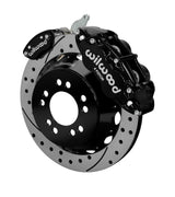 Wilwood black rear Superlite 4R service caliper and separate MC4 parking caliper around a drilled-and-slotted rotor assembly