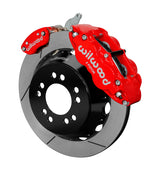 Wilwood red rear Superlite 4R service caliper and separate MC4 parking caliper around a slotted rotor assembly
