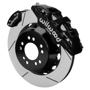 Wilwood black AERO4 service caliper and MC4 parking caliper around a 14-inch slotted rotor, shown for Currie Pro-Tour unit-bearing axles
