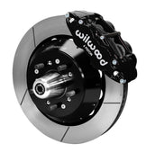 Wilwood black Superlite front caliper over a slotted rotor assembly with a projecting hub and wheel studs