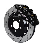 Wilwood black AERO6 front caliper with an assembled 14-inch drilled-and-slotted rotor and black mounting hat, shown for 2016–2024 Camaro