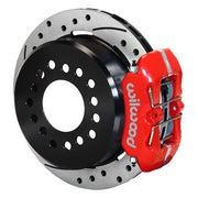 Wilwood Dynapro Low-Profile brake kit: Red low-profile Dynapro caliper beside a drilled-and-slotted rotor and deep black hat; 11-inch rear brake setup for 12-Bolt C-Clip.