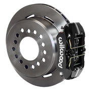 Wilwood Dynapro Low-Profile brake kit: Plain rotor with an integral deep hat beside a black low-profile Dynapro caliper; parking shoes are enclosed by the hat; 11-inch rear brake setup for 12-Bolt C-Clip.