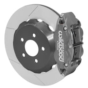 Wilwood Superlite 4R-ST brake kit: Gray anodized caliper over a slotted rotor assembled to a dark dynamic hat, without a separate wheel hub; 14-inch rear brake setup for 2015–2023 Mustang.