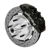 Wilwood Dynapro 6 brake kit: Single-side assembly with a black caliper, drilled-and-slotted rotor and polished aluminum hub with five wheel studs; 12.19-inch front brake setup for Pinto/Bobcat/Mustang II.