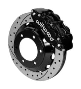 Wilwood Superlite 6R brake kit: A black Superlite caliper above a drilled-and-slotted rotor and deep black six-hole hat; 12.88-inch front brake setup for Toyota/Lexus Six-Lug.