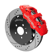 Wilwood AERO6 brake kit: Angled assembly of a red AERO6 caliper beside a drilled-and-slotted rotor and black five-hole hat; 14-inch front brake setup for Audi A4/A5/S4/S5.