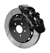 Wilwood AERO6 brake kit: Angled assembly of a black AERO6 caliper beside a slotted rotor and black five-hole hat; 14-inch front brake setup for Audi A4/A5/S4/S5.