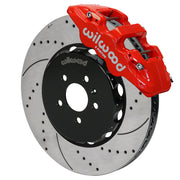 Wilwood AERO6 brake kit: Angled assembly of a red AERO6 caliper beside a drilled-and-slotted rotor and black five-hole hat; 15-inch front brake setup for Audi A4/A5/S4/S5.
