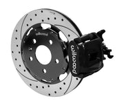 Wilwood CPB brake kit: A black combination caliper with its parking-brake mechanism beside a drilled-and-slotted rotor and black hat; 12.19-inch rear brake setup for Audi A4/S4/RS4/S5.
