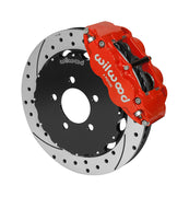 Wilwood Superlite 6R brake kit: A red caliper alongside a drilled-and-slotted rotor attached to a dark five-hole hat in an angled view; 12.88-inch front brake setup for Ford Panther Cars.