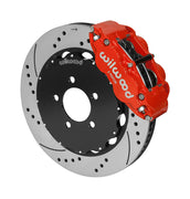 Wilwood Superlite 6R brake kit: A red caliper alongside a drilled-and-slotted rotor attached to a dark five-hole hat in an angled view; 14-inch front brake setup for Ford Panther Cars.