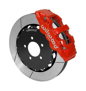 Wilwood AERO6 brake kit: A red caliper alongside a slotted rotor attached to a dark five-hole hat in an angled view; 14-inch front brake setup for Ford Panther Cars.