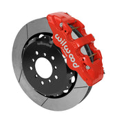 Wilwood AERO6 brake kit: A red caliper beside a slotted rotor mounted to a black five-hole hat, viewed at an angle; 14-inch front brake setup for BMW E46 M3.
