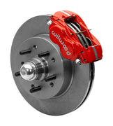 Wilwood Dynalite-M brake kit: Assembled red Dynalite caliper beside a plain rotor and integral studded hub with a polished dust cap; 11.5-inch front brake setup for 1965–1968 Chevy Full-Size.