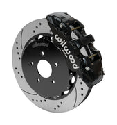 Wilwood AERO6 brake kit: Single black AERO6 caliper beside a drilled-and-slotted rotor assembled to a dark five-hole hat; 14-inch front brake setup for 350Z/G35 RWD.