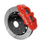 Wilwood AERO6 brake kit: Single red AERO6 caliper beside a slotted rotor assembled to a dark five-hole hat; 14-inch front brake setup for 350Z/G35 RWD.