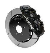 Wilwood AERO6 brake kit: Single black AERO6 caliper beside a slotted rotor assembled to a dark five-hole hat; 14-inch front brake setup for 350Z/G35 RWD.